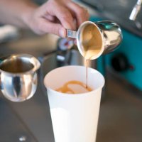 cu woman making a coffee drink - junk food stock pictures, royalty-free photos & images