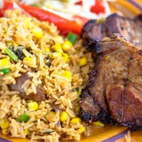 cuban cuisine: deep pork fried and yellow rice - food stock pictures, royalty-free photos & images
