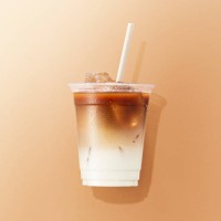 cup of cafe latte on brown background - junk food stock pictures, royalty-free photos & images
