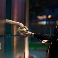 customer receiving food at drive thru - food stock pictures, royalty-free photos & images