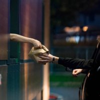 customer receiving food at drive thru - junk food stock pictures, royalty-free photos & images