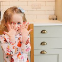 cute 3 year old showing off her nails after being painted by her cool aunt - nails art stock pictures, royalty-free photos & images