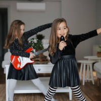 cute girls playing guitar and singing - concert stock pictures, royalty-free photos & images