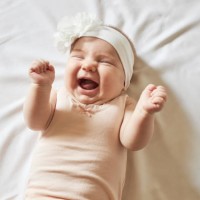 cute little baby girl laughing - fashion stock pictures, royalty-free photos & images