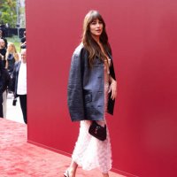 Dakota Johnson attends the Gucci Women's Spring Summer 2025 Fashion Show during the Milan Fashion Week Womenswear Spring/Summer 2025 at Triennale di...