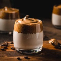 dalgona coffee with coffee beans on table - home decoration stock pictures, royalty-free photos & images