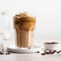 dalgona iced coffee with vegetal milk - coffee stockfoto's en -beelden