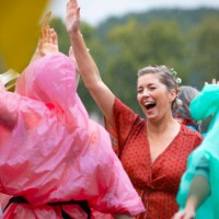 dancing in the rain - concert stock pictures, royalty-free photos & images