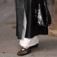 Daniela Lipps is seen outside Gauchere show wearing black net Alaia ballet flats during the Womenswear Spring/Summer 2024 as part of Paris Fashion...