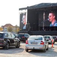 Danish singer and songwriter Mads Langer preforms at a sold-out drive-in concert at Tangkrogen in Aarhus, Denmark on April 24, 2020. / Denmark OUT
