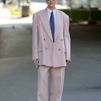 Darja Barannik wears white shirt, blue tie, pink suit, outside Stella McCartney, during the Womenswear Fall/Winter 2025/2026 as part of Paris Fashion...