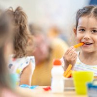 daycare children eating lunch - food stock pictures, royalty-free photos & images