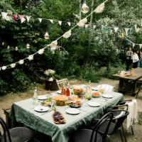 decorated back yard with food and drink set up on dining table - garden decoration stock pictures, royalty-free photos & images