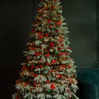 decorated christmas tree on green night background. happy holidays. - home decoration stock pictures, royalty-free photos & images