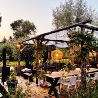 decorated table in summer setting. garden party. summer garden patio terrace. rotan light. ibiza vibe. - garden decoration stock pictures, royalty-free photos & images