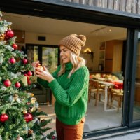 decorating my christmas tree - garden decoration stock pictures, royalty-free photos & images
