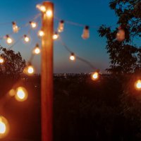 decorative lights on a beautiful summer night - garden decoration stock pictures, royalty-free photos & images
