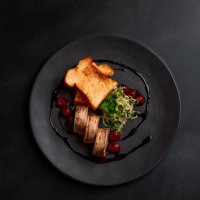 deer minced meat terrine dish duck breast with balsamic cherries in michelin star gourmet restaurant on dark background - food stock pictures, royalty-free photos & images