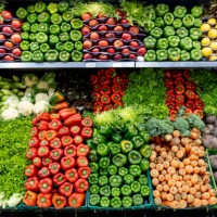 delicious fresh vegetables and fruits at the refrigerated section of a supermarket - food stock pictures, royalty-free photos & images