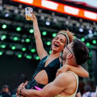 delighted couple at music festival. - concert stock pictures, royalty-free photos & images