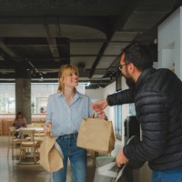 delivering food to the office - food stock pictures, royalty-free photos & images