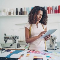 designer with a digital tablet - fashion stock pictures, royalty-free photos & images