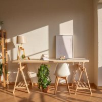desktop for home office made by timber and sawhorses in a nordic style apartment. mockup frame empty copy space - home decoration stock pictures, royalty-free photos & images