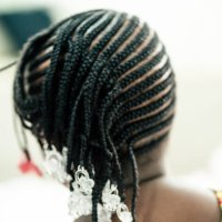 detailed of daughter's hair by her mother - hairstyle stock pictures, royalty-free photos & images
