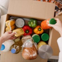 details of volunteer with box of food for poor - food stock pictures, royalty-free photos & images