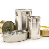 different tins of food isolated on white background - food stock pictures, royalty-free photos & images
