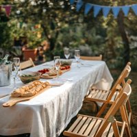 dining table with appetizers for birthday party at backyard - garden decoration stock pictures, royalty-free photos & images