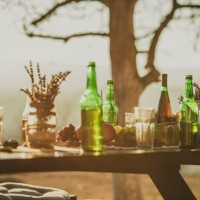 dining table with drinks for party at backyard during autumn - garden decoration stock pictures, royalty-free photos & images