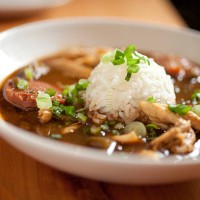 dinner consisting of chicken gumbo with rice - food stock pictures, royalty-free photos & images
