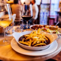 dinner with meat dish and wine at spanish restaurant in madrid, spain - food stock pictures, royalty-free photos & images