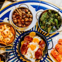 dinner with traditional spanish dishes at the restaurant in barcelona, spain - food stock pictures, royalty-free photos & images