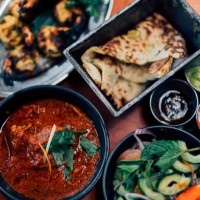 directly above shot of assorted authentic indian food in plates on table - junk food stock pictures, royalty-free photos & images