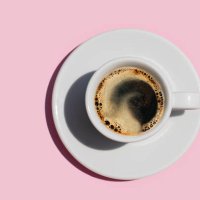 directly above shot of coffee on pink color background. - coffee stock pictures, royalty-free photos & images