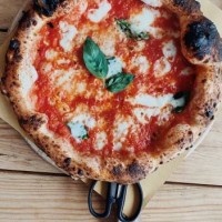 directly above shot of pizza on table - junk food stock pictures, royalty-free photos & images