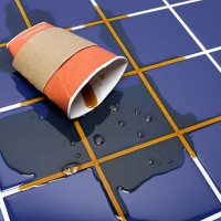 disposable coffee cup crushed on tile floor, studio shot - junk food stock pictures, royalty-free photos & images