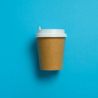 disposable paper cup with lid for coffee and tea on a bright pastel blue background. coffee break. the concept of environmental protection. copy space. - junk food stock pictures, royalty-free photos & images
