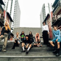 diverse group of trendy friends in urban setting, exuding style and confidence - fashion stock pictures, royalty-free photos & images