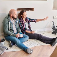 diy couple taking a break - home decoration stock pictures, royalty-free photos & images