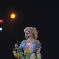 Dolly Parton performs on stage at the Hammersmith Odeon in London, England on November 20, 1978.