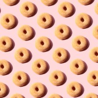 doughnuts on the pink background - junk food stock pictures, royalty-free photos & images
