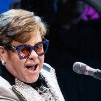 Dpatop - 27 April 2023, Bavaria, Munich: Singer and pianist Elton John sits in the Olympic Hall in Munich. Photo: Sven Hoppe/dpa - ATTENTION: Only...