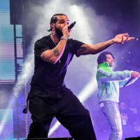 Drake and 21 Savage perform onstage during 