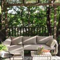 drinks on table by empty sofa at patio on sunny day - garden decoration stock pictures, royalty-free photos & images