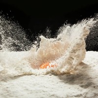 drop egg on wheat flour - food stock pictures, royalty-free photos & images