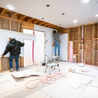 drywall installers working in kitchen renovation - home decoration stock pictures, royalty-free photos & images
