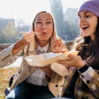 eating chinese food on the street - junk food stock pictures, royalty-free photos & images